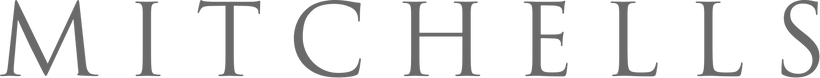 Stanley Korshak - Mitchell Stores logo