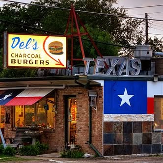 Del's Charcoal Burgers logo